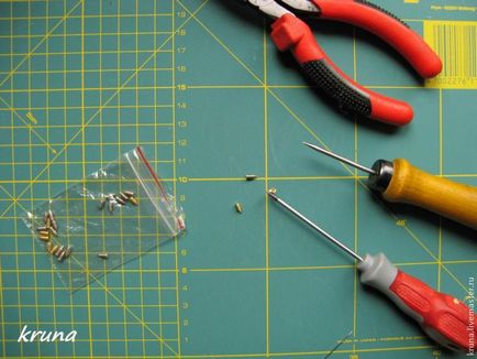 Fabricarea unei pungi cu o clemă, fixată cu ajutorul șuruburilor sau șuruburilor de blocare