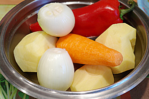 Carne cu legume într-o scoică