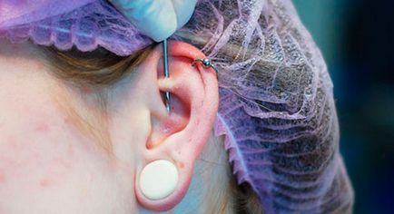 Пірсинг вуха особливості проколу, вибір прикраси і фото