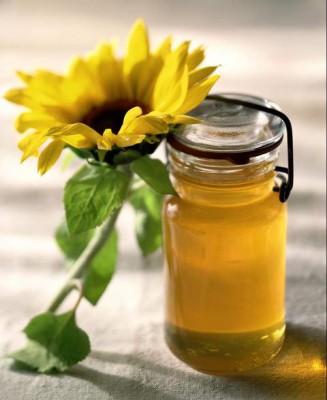 Uimitoare miere de floarea-soarelui utile și proprietăți medicinale