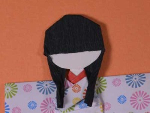 Варіанти оформлення японської паперової ляльки чіогамі нінгьо, каракулі