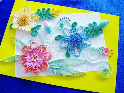 Aranjament luminos de flori în tehnica de quilling