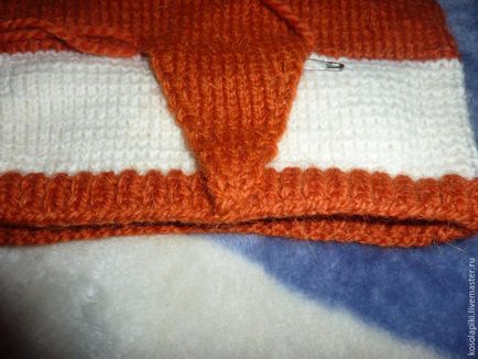 Am tricot cu un capac de tricotat 