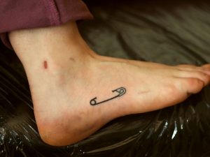 Булавка татуювання (значення, ескізи, фото), tattoofotos
