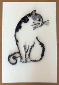 Instrucțiuni pentru crearea de pisici de hârtie în tehnica de quilling