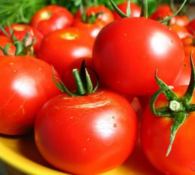 Tomatoes Sunrise f1 Descrierea varietății și descrierea acesteia