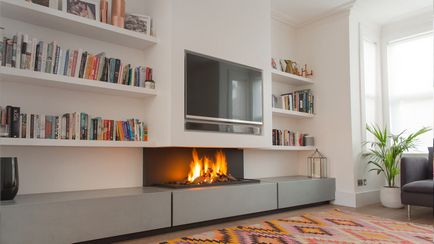 Négy ok, hogy ne tegye a TV a kandalló felett (és hasznos tanácsokat, ha kénytelen megtenni) (TV) Négy ok, hogy ne tegye a TV a kandalló felett (és hasznos tanácsokat, ha kénytelenek megtenni)