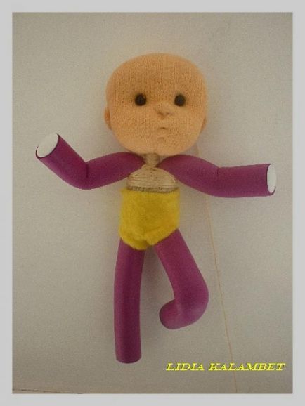 Розвиваюча ігрова лялька з папільоток