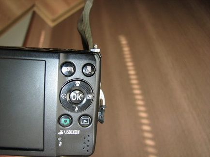 Nikon coolpix l22 repara capacul bateriei