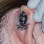 Tattoo Penguin érték, és a fénykép miniatűr