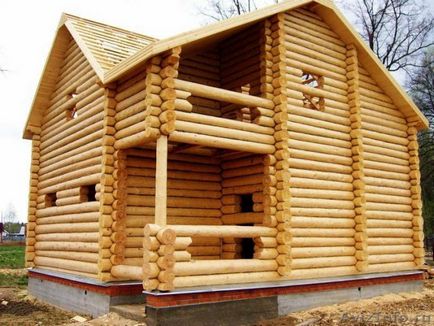 Case din lemn stratificat cu grinzi profilate si constructii