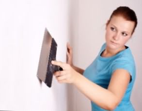Як видалити шпаклівку зі стін