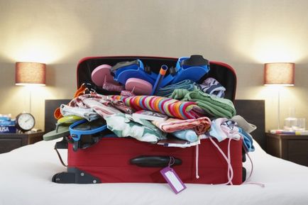 Top 8 sfaturi pentru a economisi spațiu într-o valiză, portofelul de sex feminin