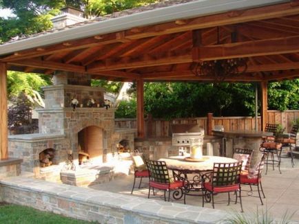 Terasz grill a fényképet nyaraló (faház) Veranda barbecue a ház Photo