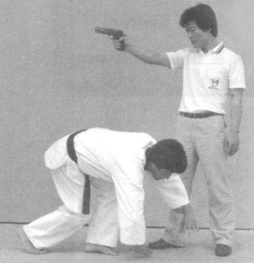 Protecție de arme de foc - pistol-leu - club de copii de taekwondo