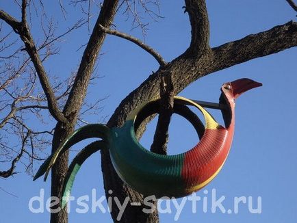 Játszótér a gumiabroncsok - állatfigurák a kezüket, a gyerekek saytik