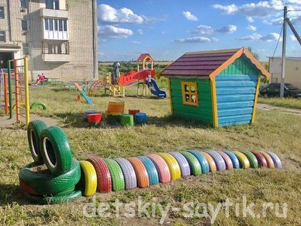 Játszótér a gumiabroncsok - állatfigurák a kezüket, a gyerekek saytik