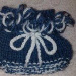 Tricotate cap - albine - ace de tricotat pentru un nou-născut