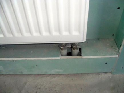 Cum să ascundeți conductele de încălzire într-o casă privată