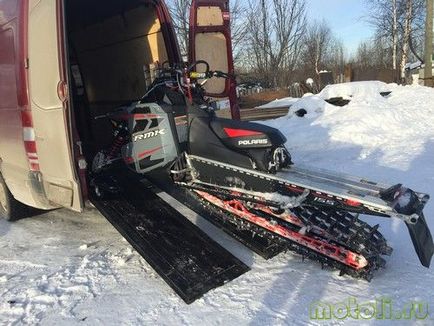 Transport cu snowmobile