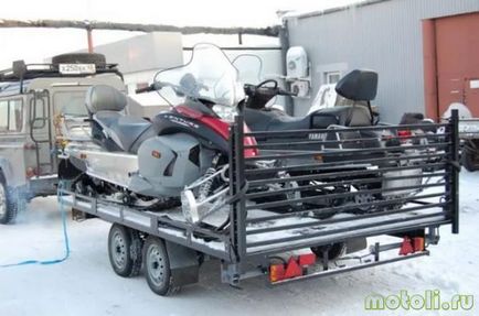 Transport cu snowmobile