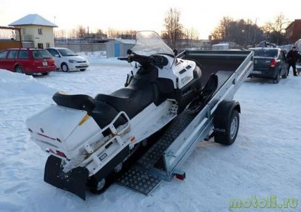 Transport cu snowmobile