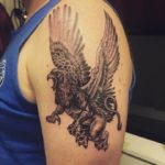 Griffin tetoválás jelenti tervez a férfiak és fényes fotó munkák