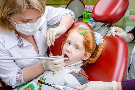 A gyermek egy fogfájás - lehetséges okok és kezelés
