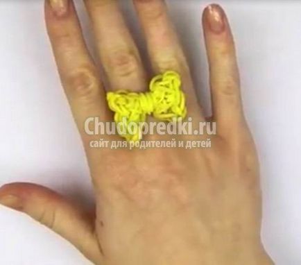 Hogyan szőni egy gyűrű gumiszalag do kézműves virág és egy íjat (videó) Hogyan szőni egy gyűrű gumiszalag csinál kézműves virággal, és hogy egy íj
