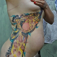 Girafa tatuaj - valoare, schițe de tatuaje și fotografii
