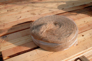 Конопатка дерев'яного будинку способи закладення швів