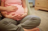 Чому болить крижі під час вагітності