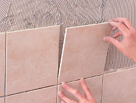 Облицювання стін керамічною плиткою у ванній