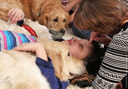 Cum câinii ajută copiii bolnavi