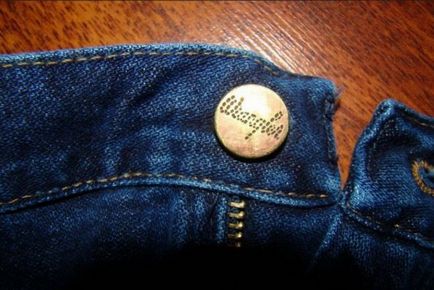 Як поміняти гудзик в джинсах