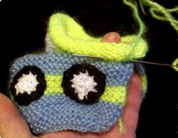 Cum să tricot cizme cu ace de tricotat (vă sugerăm) Cum să Knit Booties cu ace de tricotat