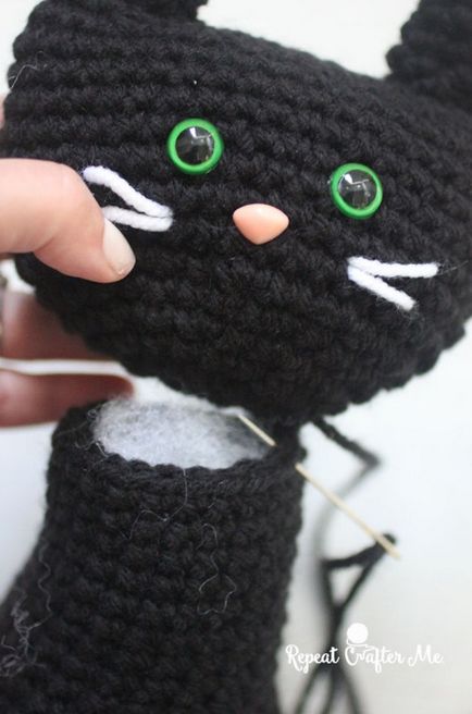 A rendszer a kötés Amigurumi horgolt macska