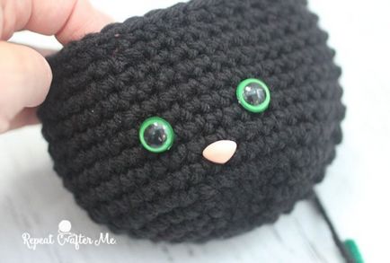 A rendszer a kötés Amigurumi horgolt macska