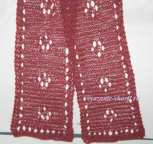 Tricotat o eșarfă pentru copii cu ace de tricotat sub forma unui chanterelle