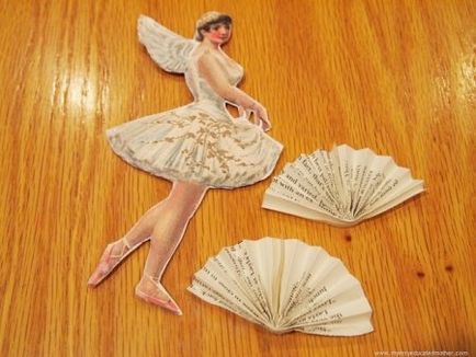 Snowflake-balerina dintr-o schemă de hârtie, un șablon pentru tăierea cu o fotografie