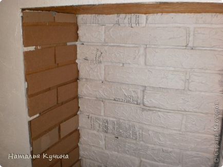 Sham kandalló kezével (kandallók) Sham kandalló kezével