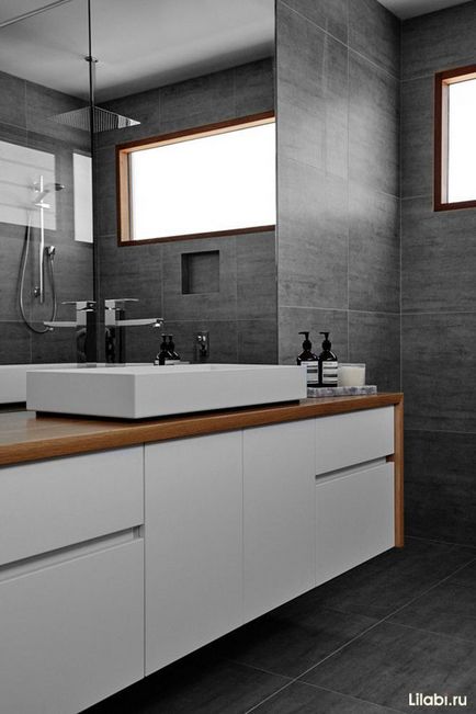 Дизайн інтер'єру сірою ванної кімнати сірі стіни у ванній, сіра плитка та підлога, фото