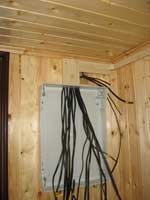 Lucrări electrice în case de lemn, cabane