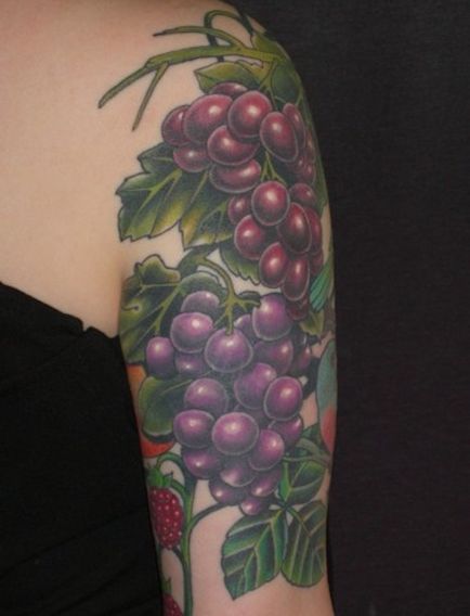 Фото і значення татуювання виноград