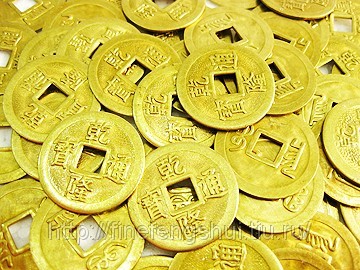 Ca un simbol al monedelor chinezești de pe Feng Shui puteți să vă aduceți bani noroc