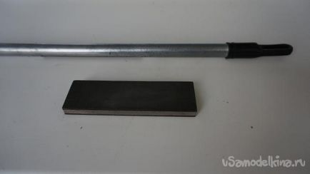 Пристосування для формування ріжучої кромки і заточки ножа