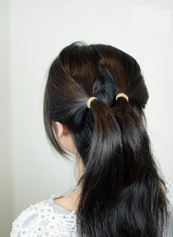 O modalitate simplă de a face un arc de la părul tău