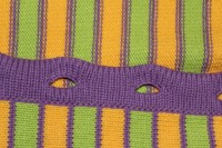 Butoniere pe o mașină de tricotat