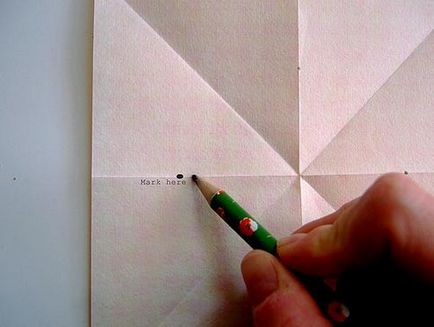 Hogyan lehet a papír nyolcszögletű csillag-felfüggesztés