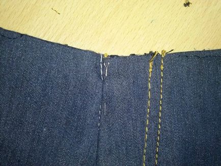 Manipularea fermoarelor (pe jachete, pantaloni scurți, pantaloni